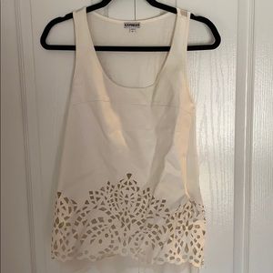 Faux leather cream top